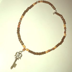 Necklace with key pendant